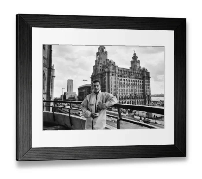 Framed Print : British cyclist Chris Boardman poses in front of the Royal Liver Building in Liverpool Framed Print : British cyclist Chris Boardman poses in front of the Royal Liver Building in Liverpool
