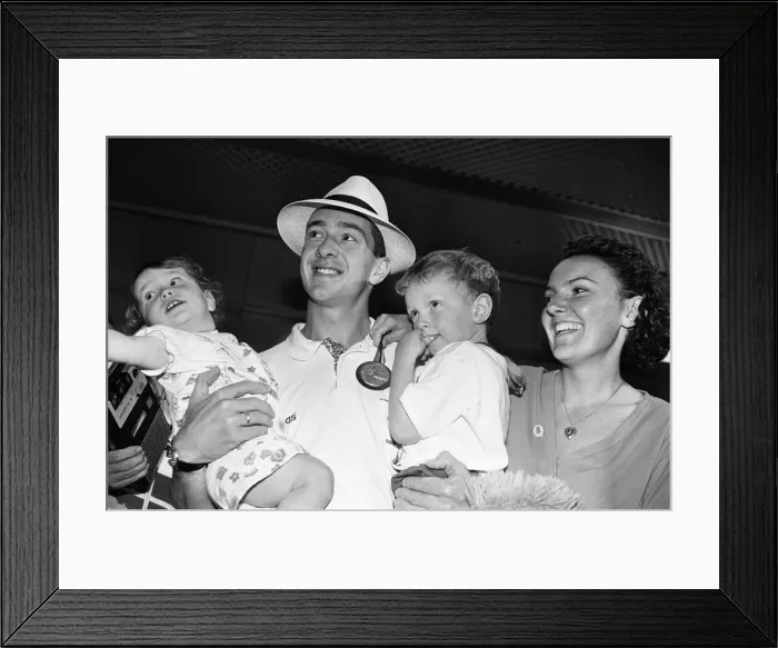 Framed Print : British cyclist Chris Boardman poses with his family on arrival at Manchester airport as