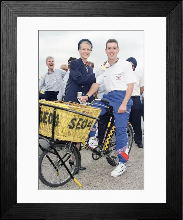Framed Print : British cyclist Chris Boardman poses on arrival at Heathrow Airport as he returns home Framed Print : British cyclist Chris Boardman poses on arrival at Heathrow Airport as he returns home