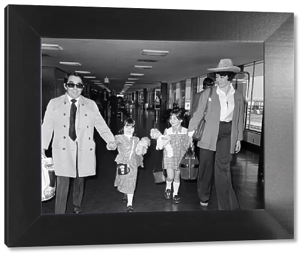 The departure of Ronnie Corbett and his wife Anne with daughters Sophie, 5 and Emma
