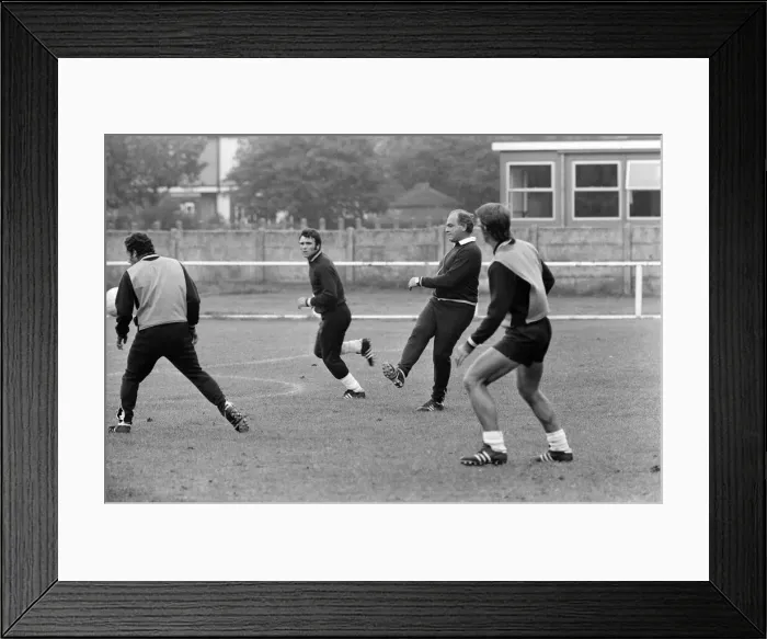 Framed Print : Alfredo Di Stefano shows his boys the Valencia FC how to do it as they train for their Framed Print : Alfredo Di Stefano shows his boys the Valencia FC how to do it as they train for their