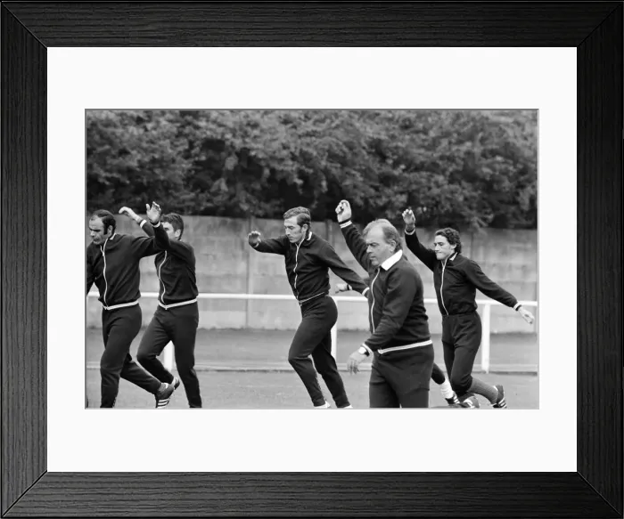 Framed Print : Alfredo Di Stefano shows his boys the Valencia FC how to do it as they train for their Framed Print : Alfredo Di Stefano shows his boys the Valencia FC how to do it as they train for their