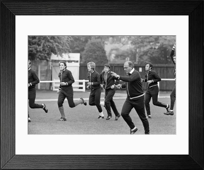 Framed Print : Alfredo Di Stefano shows his boys the Valencia FC how to do it as they train for their Framed Print : Alfredo Di Stefano shows his boys the Valencia FC how to do it as they train for their