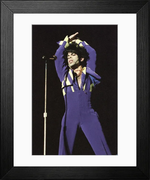 Framed Print : American pop star Prince performing on stage at the National Indoor Arena in Birmingham Framed Print : American pop star Prince performing on stage at the National Indoor Arena in Birmingham
