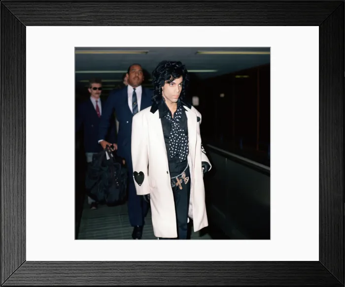 Framed Print : American pop star Prince at Heathrow Airport. Ahead of his concerts in the UK for his Framed Print : American pop star Prince at Heathrow Airport. Ahead of his concerts in the UK for his