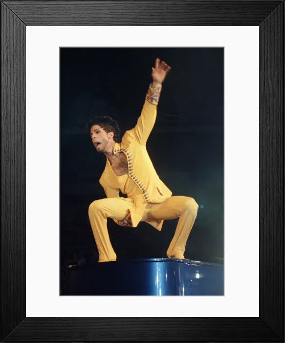 Framed Print : American pop star Prince performing on stage at Earls Court