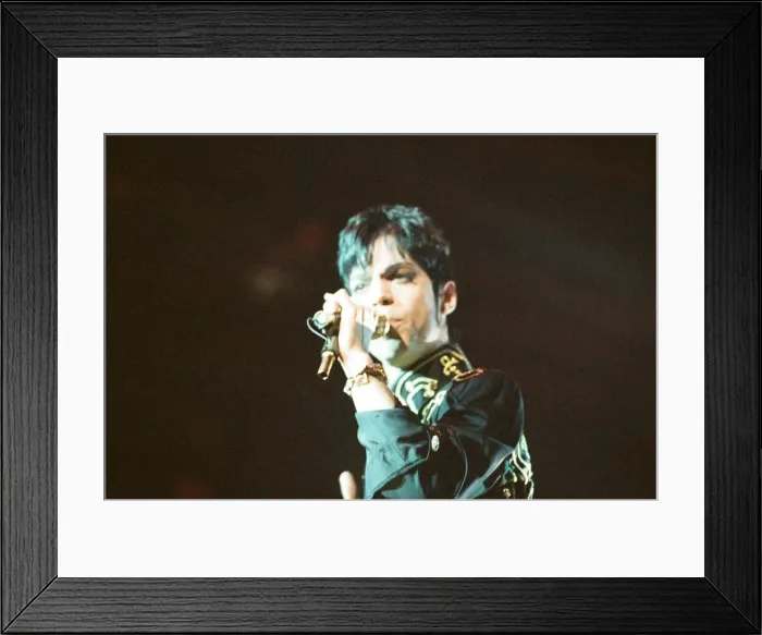 Framed Print : Prince performing on stage during his Ultimate Live Experience Tour Framed Print : Prince performing on stage during his Ultimate Live Experience Tour