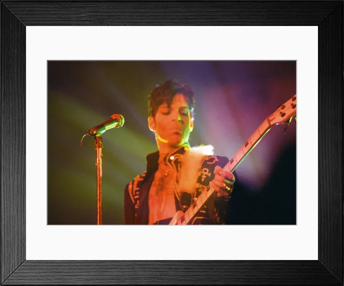 Framed Print : Prince performing on stage during his Ultimate Live Experience Tour Framed Print : Prince performing on stage during his Ultimate Live Experience Tour