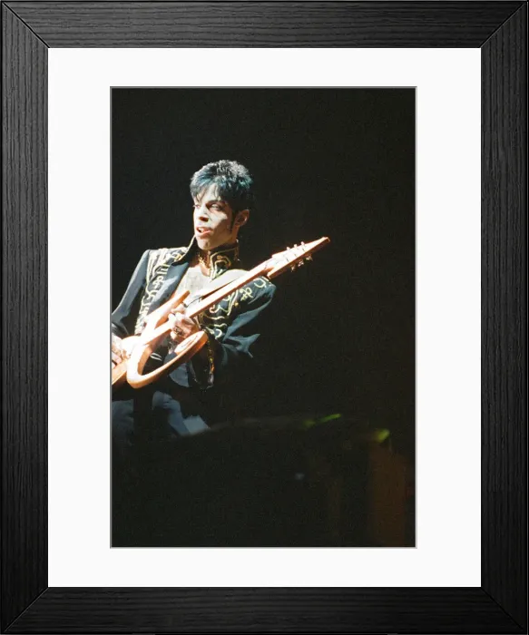 Framed Print : Prince performing on stage during his Ultimate Live Experience Tour Framed Print : Prince performing on stage during his Ultimate Live Experience Tour