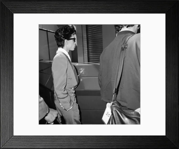 Framed Print : Prince, american singer, at London Heathrow Airport, leaving for The Netherlands Framed Print : Prince, american singer, at London Heathrow Airport, leaving for The Netherlands