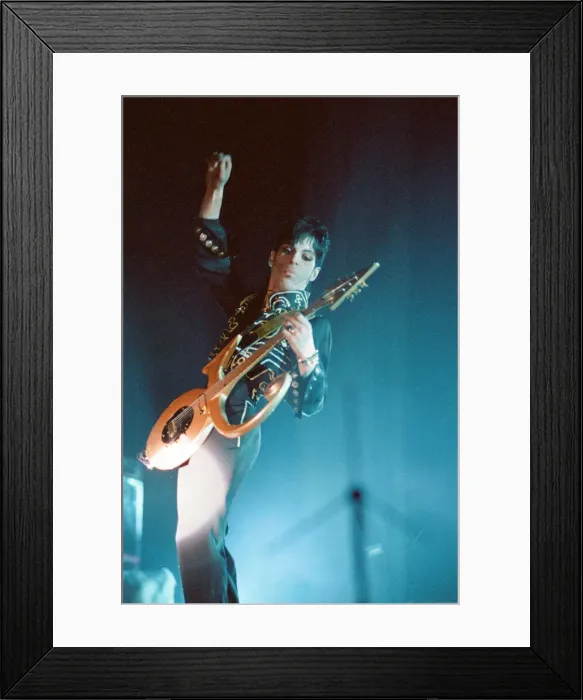 Framed Print : Prince performing on stage during his Ultimate Live Experience Tour Framed Print : Prince performing on stage during his Ultimate Live Experience Tour