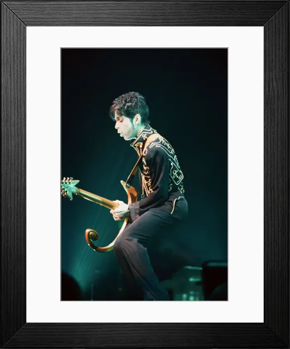 Framed Print : Prince performing on stage during his Ultimate Live Experience Tour Framed Print : Prince performing on stage during his Ultimate Live Experience Tour