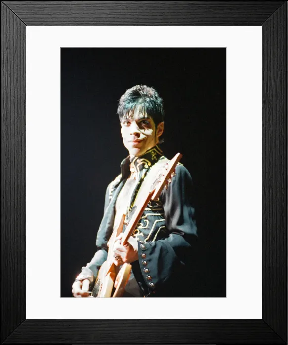 Framed Print : Prince performing on stage during his Ultimate Live Experience Tour Framed Print : Prince performing on stage during his Ultimate Live Experience Tour