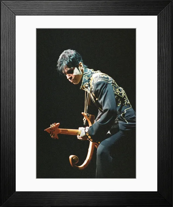 Framed Print : Prince performing on stage during his Ultimate Live Experience Tour Framed Print : Prince performing on stage during his Ultimate Live Experience Tour
