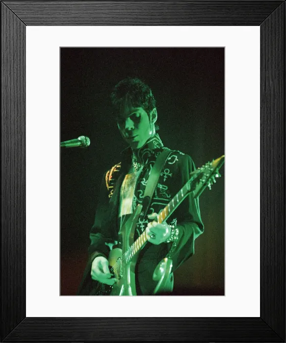 Framed Print : Prince performing on stage during his Ultimate Live Experience Tour Framed Print : Prince performing on stage during his Ultimate Live Experience Tour