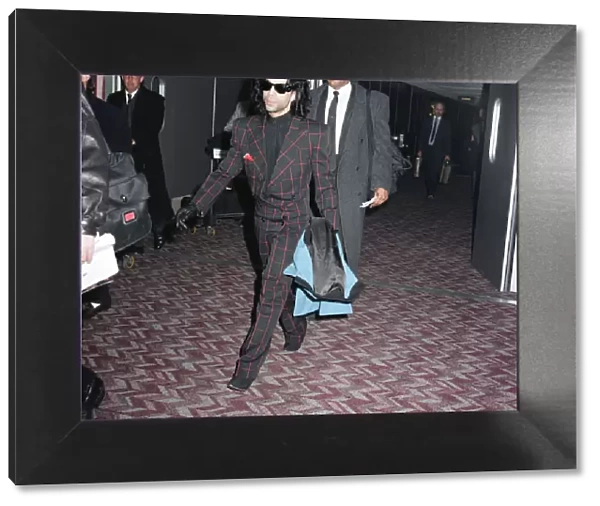 American pop star Prince arrives at Heathrow Airport in London. 19th January 1989