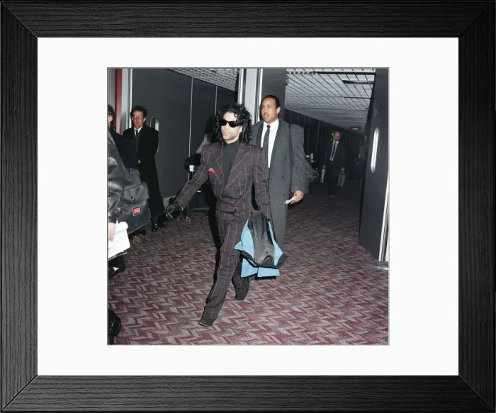 Framed Print : American pop star Prince arrives at Heathrow Airport in London. 19th January 1989