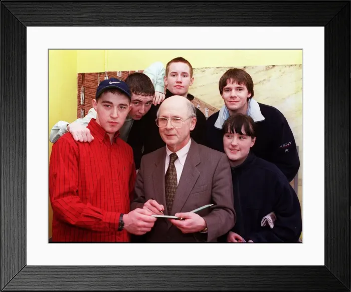 Framed Print : Fergus McCann signing autographs for fans March 1999