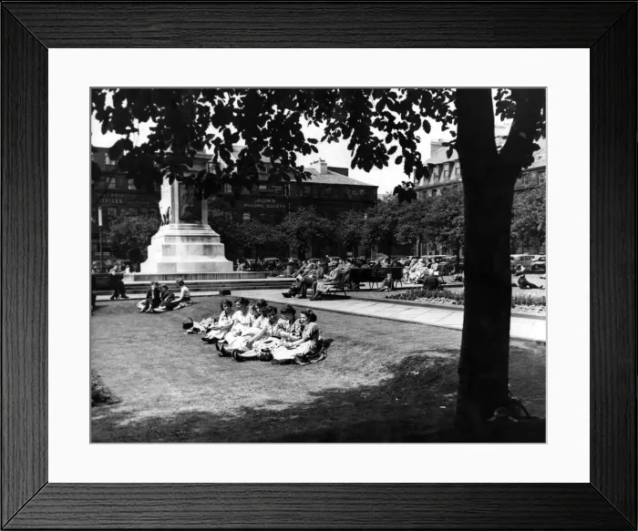Framed Print : Good weather brings many people to Eldon Square to bask in the sun during their lunch Framed Print : Good weather brings many people to Eldon Square to bask in the sun during their lunch