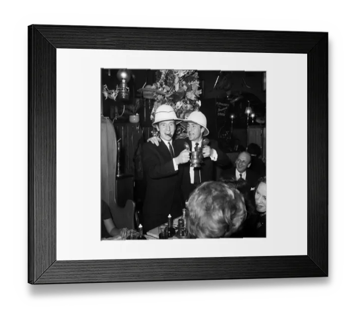 Framed Print : Tottenham Hotspur footballers Cliff Jones and Jimmy Greaves enjoying themselves at a Framed Print : Tottenham Hotspur footballers Cliff Jones and Jimmy Greaves enjoying themselves at a