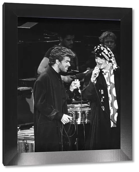 George Michael and Boy George performing at the Stand by Me