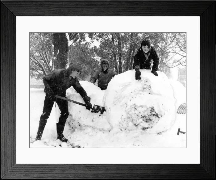 Framed Print : Weather - Snow - Three youngsters have a fine time as they enjoyed themselves in Framed Print : Weather - Snow - Three youngsters have a fine time as they enjoyed themselves in