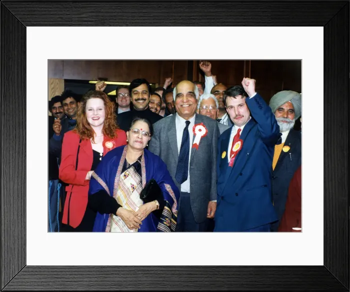 Framed Print : Victorious Labour Party candidates Parshotam Joshi and George Duggins celebrate their
