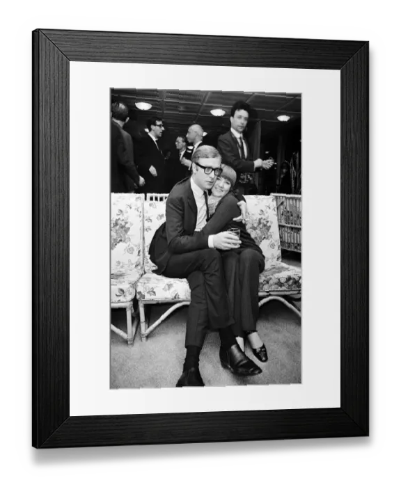 Framed Print : Michael Caine, who stars in the film Alfie poses with Cilla Black Framed Print : Michael Caine, who stars in the film Alfie poses with Cilla Black