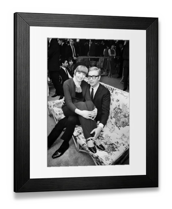Framed Print : Michael Caine, who stars in the film Alfie poses with Cilla Black