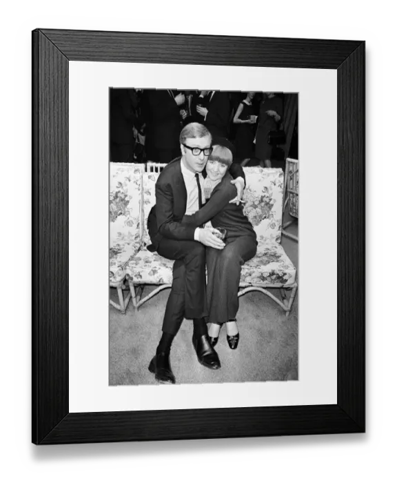 Framed Print : Michael Caine, who stars in the film Alfie poses with Cilla Black Framed Print : Michael Caine, who stars in the film Alfie poses with Cilla Black
