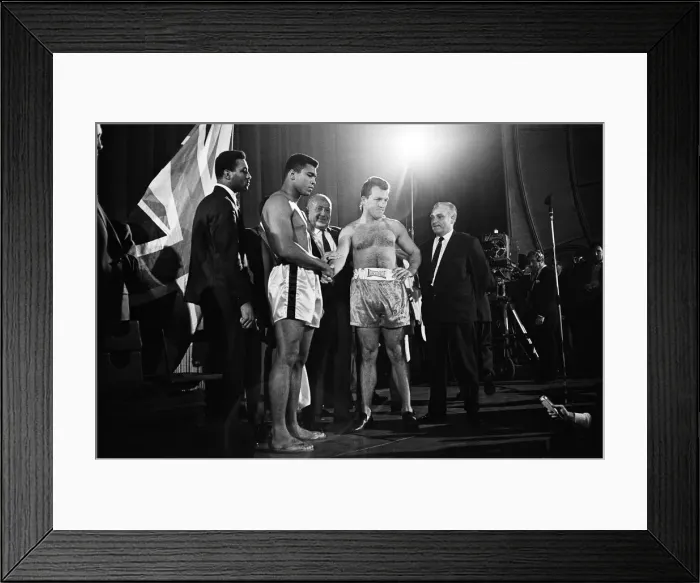 Framed Print : Muhammad Ali (left) and Brian London shake hands at the weigh-in ahead of their Framed Print : Muhammad Ali (left) and Brian London shake hands at the weigh-in ahead of their