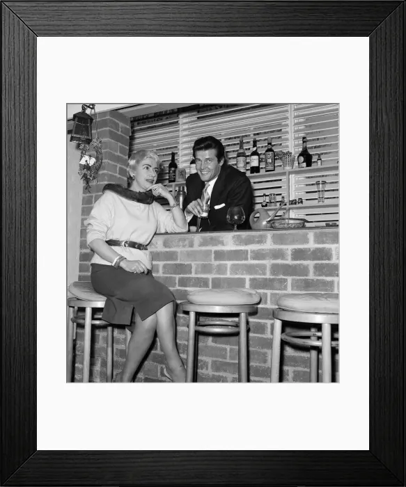 Framed Print : Singer Dorothy Squires with her husband, actor Roger Moore. 14th March 1958 Framed Print : Singer Dorothy Squires with her husband, actor Roger Moore. 14th March 1958