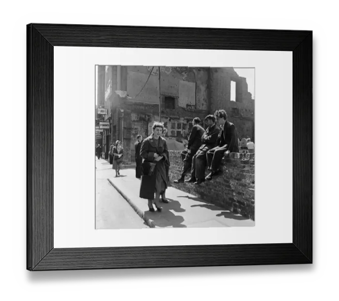 Framed Print : Workmen sit on a wall of a city street and enjoy their lunch break Framed Print : Workmen sit on a wall of a city street and enjoy their lunch break
