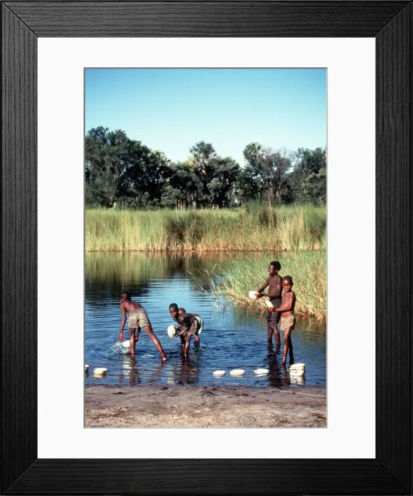 Framed Print : Botswana children wash in the Okauango Delta Msi Framed Print : Botswana children wash in the Okauango Delta Msi