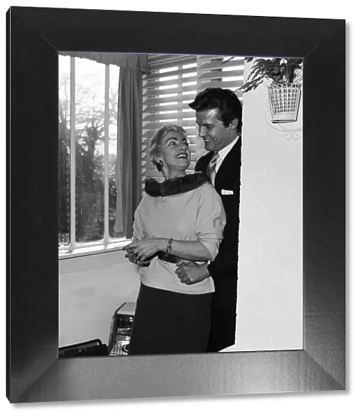 Singer Dorothy Squires photographed at home in Bexley Kent, with her husband Roger Moore