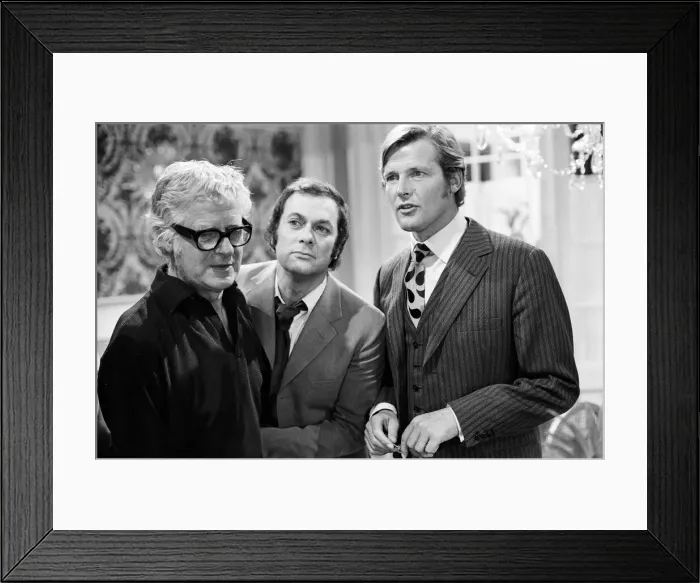 Framed Print : Roger Moore and Tony Curtis fight with each other on the set of The Persuaders