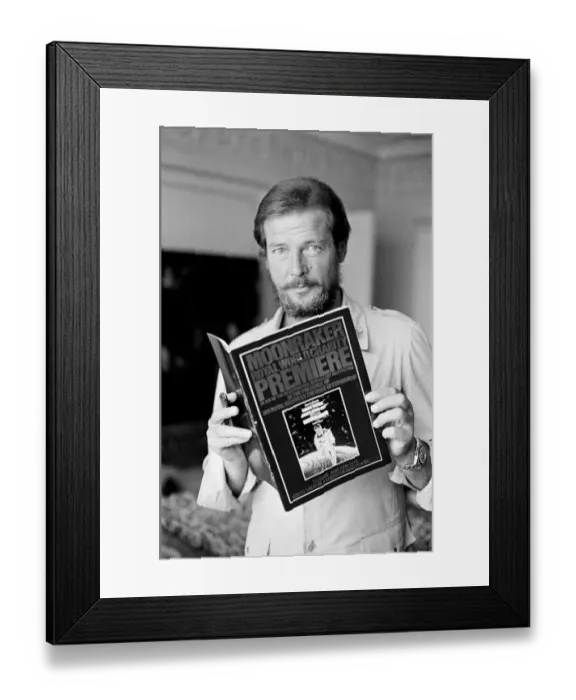 Framed Print : Roger Moore who is in London for the World charity premiere of the new James Bond film