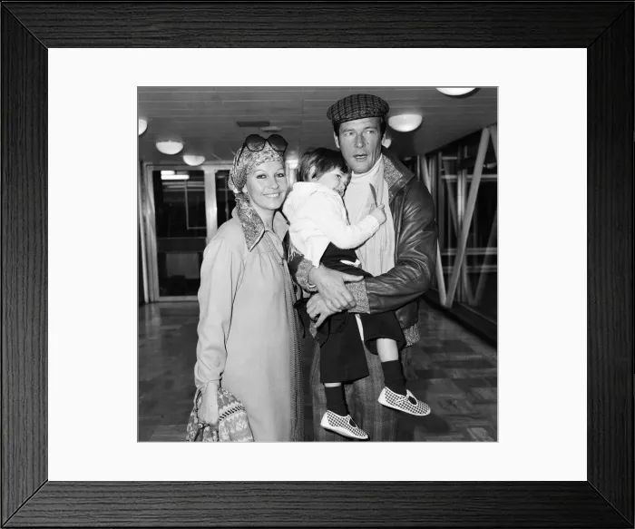 Framed Print : Roger Moore, off to Los Angeles from Heathrow Airport, is planning to a make a comedy