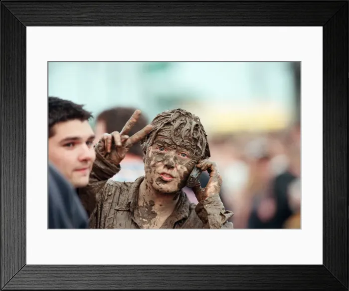 Framed Print : Fans covered in mud, at Margam Park to watch Catatonia performing, South Wales Framed Print : Fans covered in mud, at Margam Park to watch Catatonia performing, South Wales