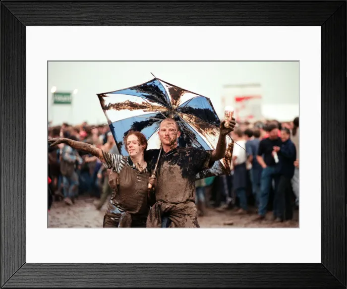 Framed Print : Fans covered in mud, at Margam Park to watch Catatonia performing, South Wales Framed Print : Fans covered in mud, at Margam Park to watch Catatonia performing, South Wales
