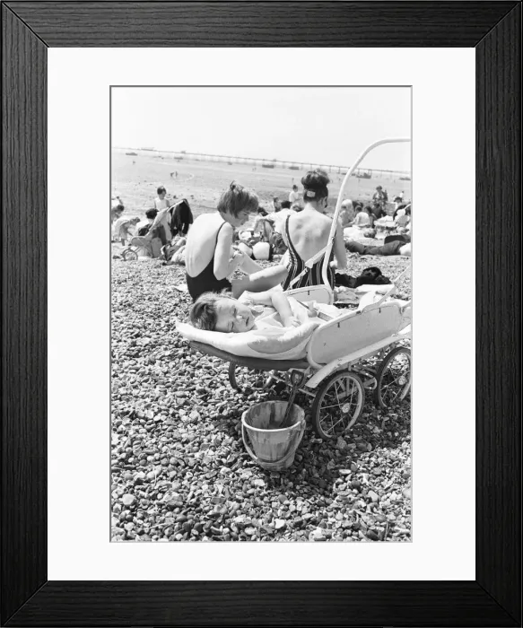 Framed Print : This little day-tripper to Southends beach, takes a well earned nap after a long Framed Print : This little day-tripper to Southends beach, takes a well earned nap after a long