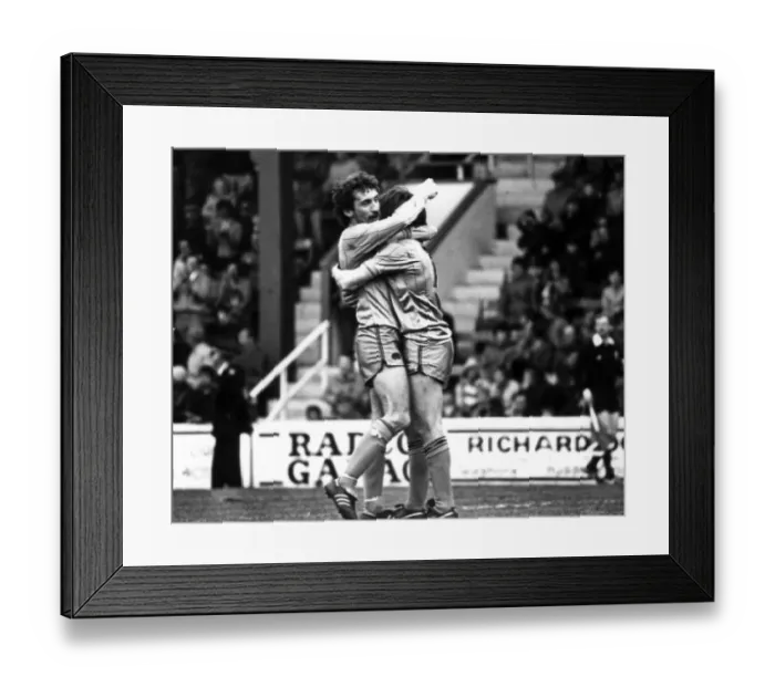 Framed Print : Huddersfield Town v Newcastle United. Terry McDermott embraces Beardsley after his goal