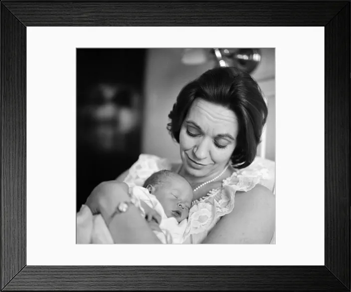 Framed Print : Holding her 12-hour old baby is stage and TV actress Lillias Walker Framed Print : Holding her 12-hour old baby is stage and TV actress Lillias Walker