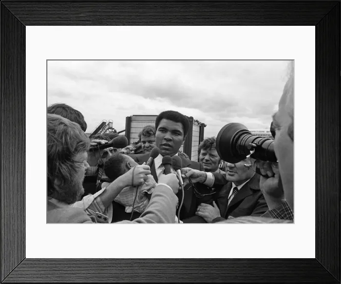 Framed Print : Muhammad Ali arrives at Teesside Airport with his family. July 1977