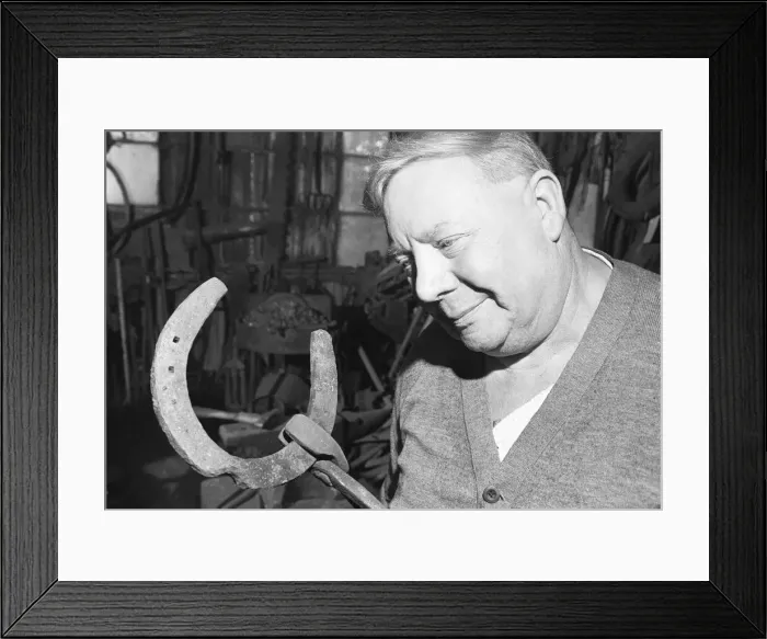 Framed Print : Blacksmith Horace Tubby Lovegrove seen here at work at his forge Framed Print : Blacksmith Horace Tubby Lovegrove seen here at work at his forge