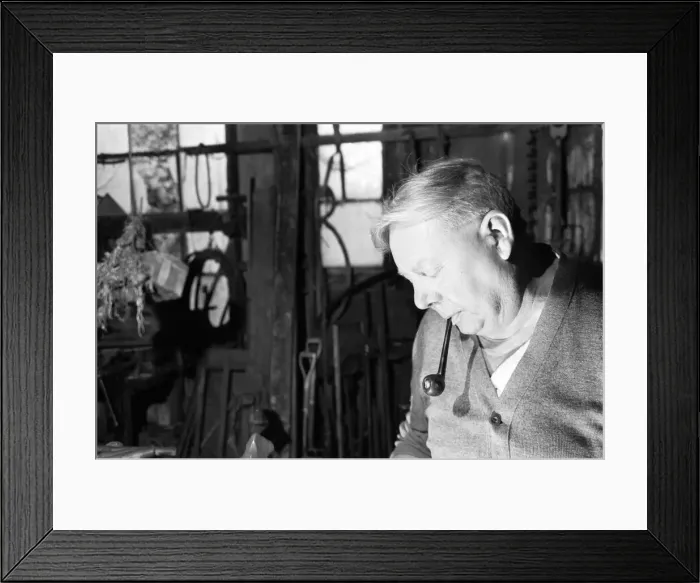 Framed Print : Blacksmith Horace Tubby Lovegrove seen here at work at his forge Framed Print : Blacksmith Horace Tubby Lovegrove seen here at work at his forge