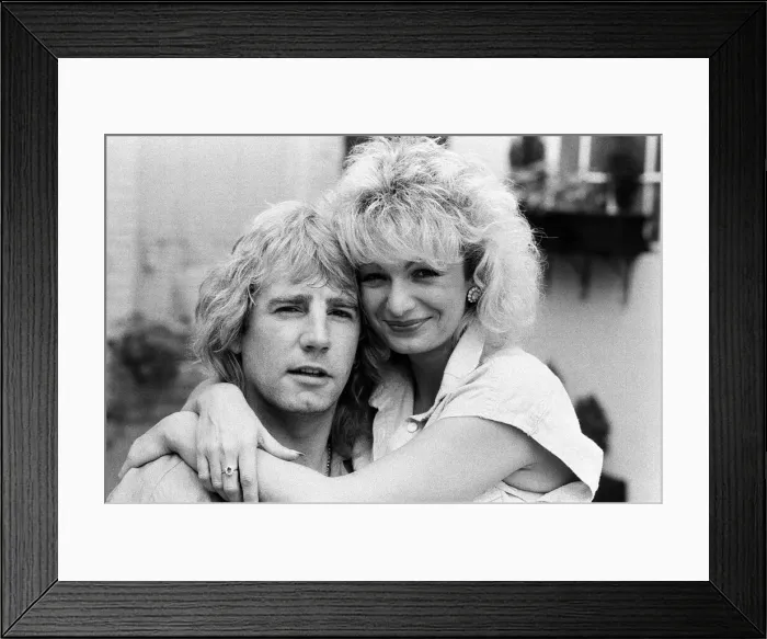 Framed Print : Status Quo band member Rick Parfitt and his new girlfriend Patty Beedon. 12th July 1985 Framed Print : Status Quo band member Rick Parfitt and his new girlfriend Patty Beedon. 12th July 1985