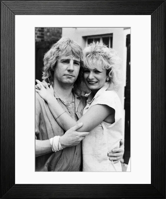 Framed Print : Status Quo band member Rick Parfitt and his new girlfriend Patty Beedon. 12th July 1985 Framed Print : Status Quo band member Rick Parfitt and his new girlfriend Patty Beedon. 12th July 1985
