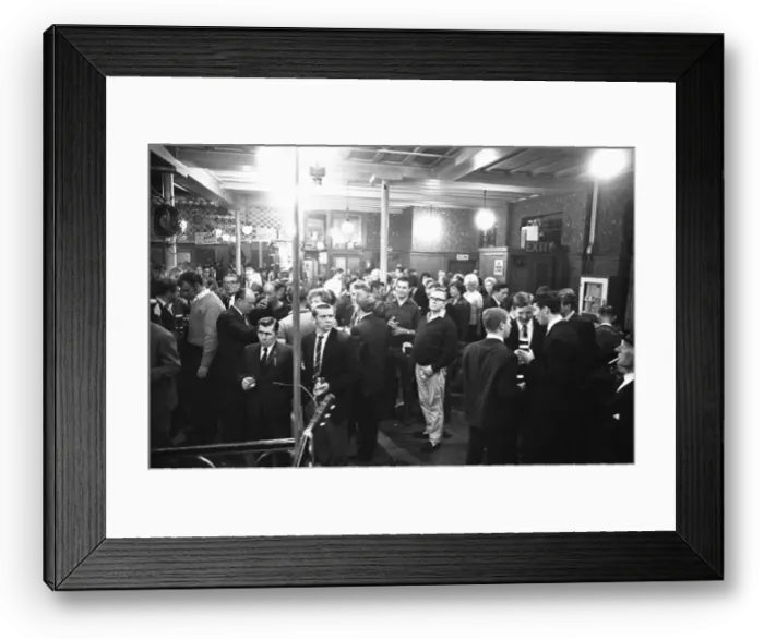 Framed Print : Pub goers awaiting the cabaret at a pub in Londons East End on a Saturday night Framed Print : Pub goers awaiting the cabaret at a pub in Londons East End on a Saturday night
