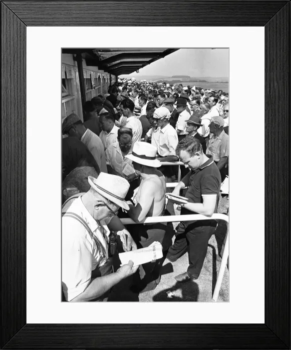 Framed Print : Glorious Goodwood 1963 Racegoers on The Trundle, the Iron Age hill fort which is Framed Print : Glorious Goodwood 1963 Racegoers on The Trundle, the Iron Age hill fort which is